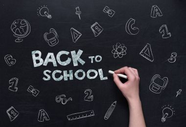 back to school lettering on blackboard clipart