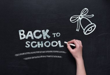 back to school lettering on blackboard clipart