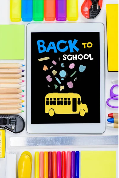 Tablet and school supplies — Stock Photo, Image