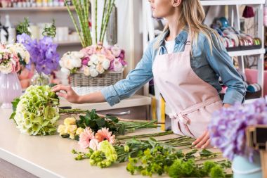 florist working in flower shop clipart