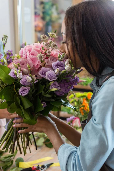 African american florist with flowers