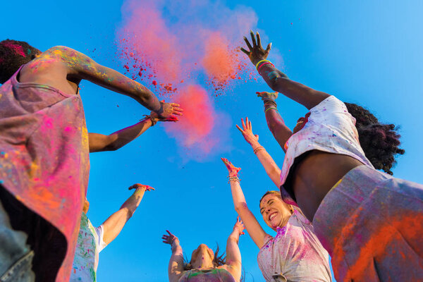 Happy friends at holi festival Royalty Free Stock Images