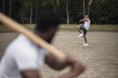 men playing baseball  clipart