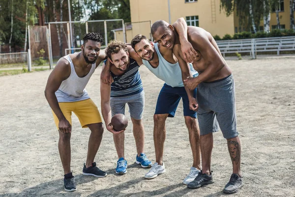 Multicultural football players — Free Stock Photo