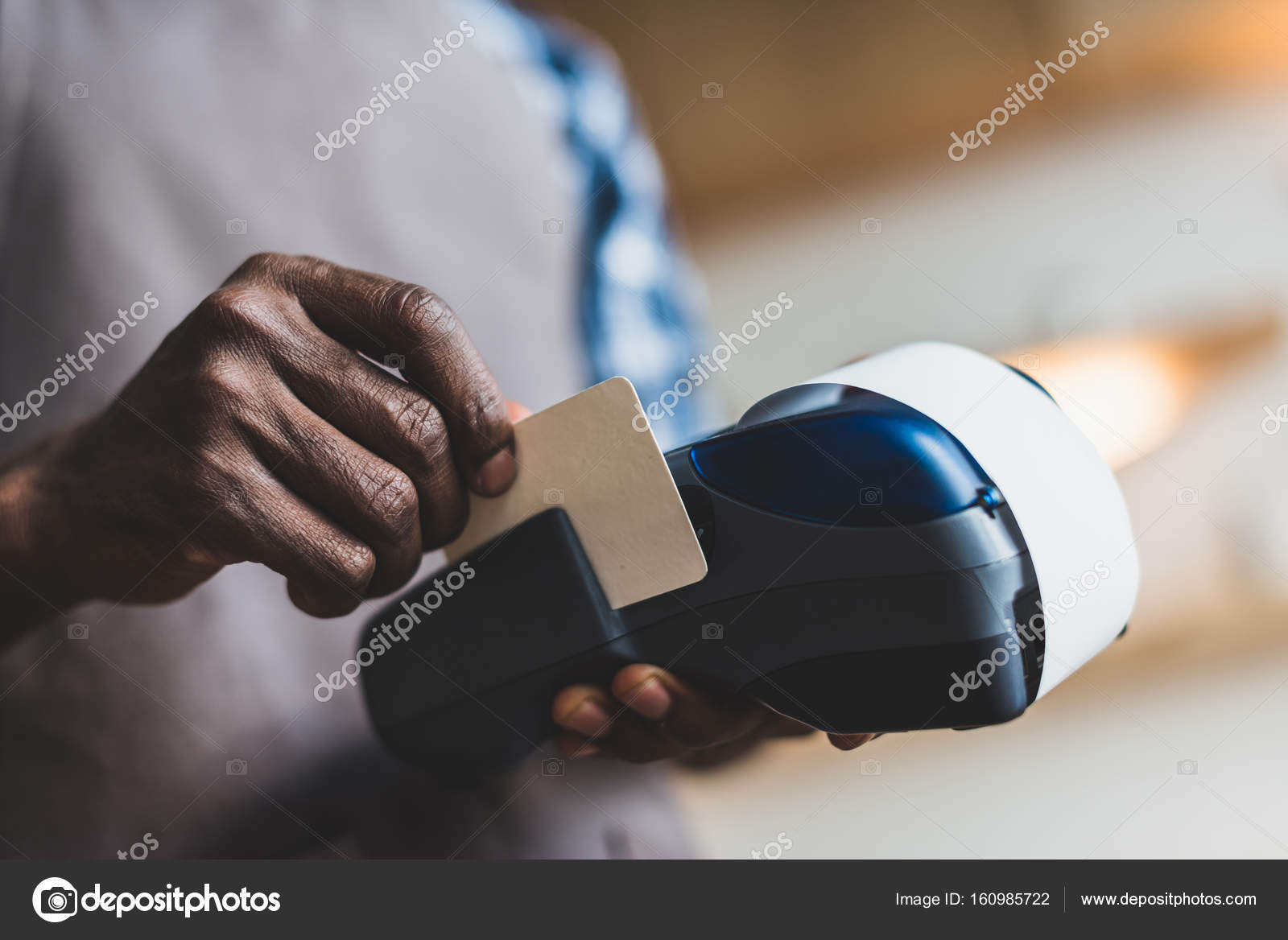 Waiter doing credit card payment — Stock Photo © ArturVerkhovetskiy