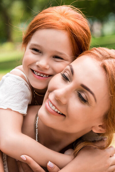 beautiful happy mother and daughter 