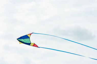 Kite flying in sky clipart
