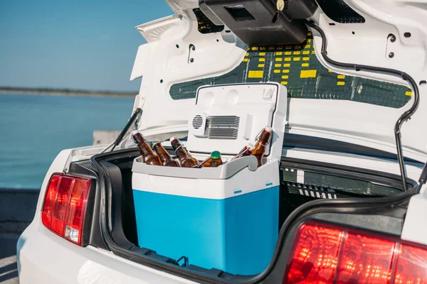 Portable fridge with beer in car — Stock Photo, Image