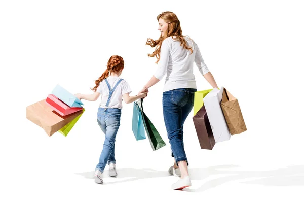 Mother and daughter with shopping bags — Stock Photo, Image
