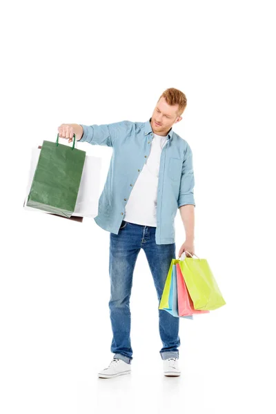 Hombre joven con bolsas de compras —  Fotos de Stock