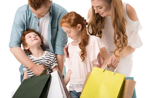 Familia feliz con bolsas de compras — Foto de Stock