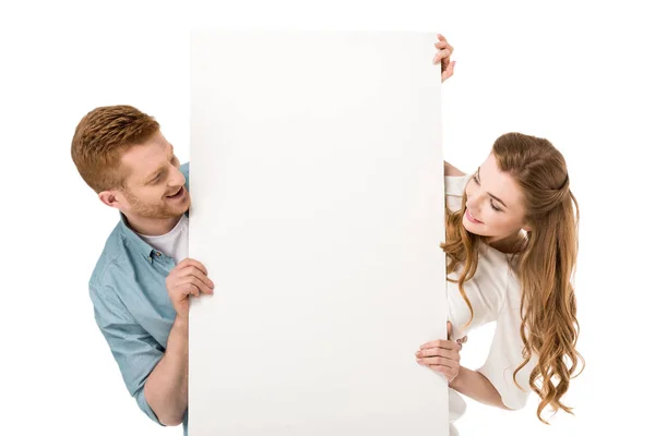 Casal segurando banner em branco — Fotografia de Stock