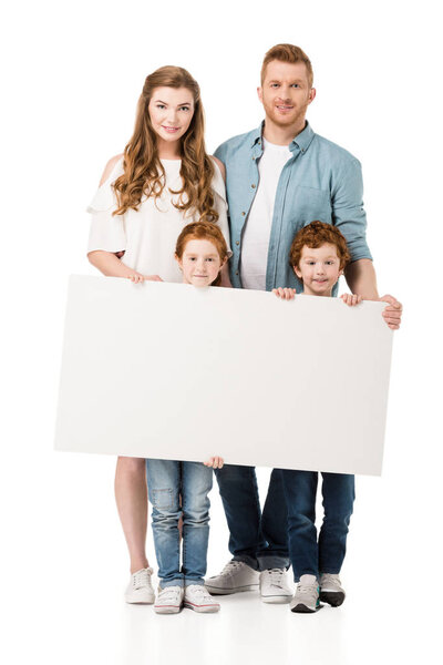 happy family holding banner
