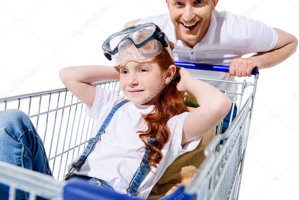 father and daughter with shopping trolley