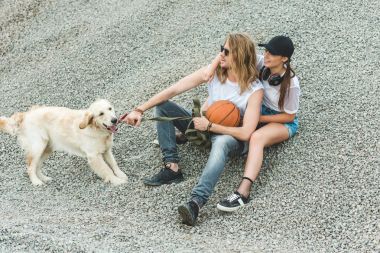 young couple with dog clipart