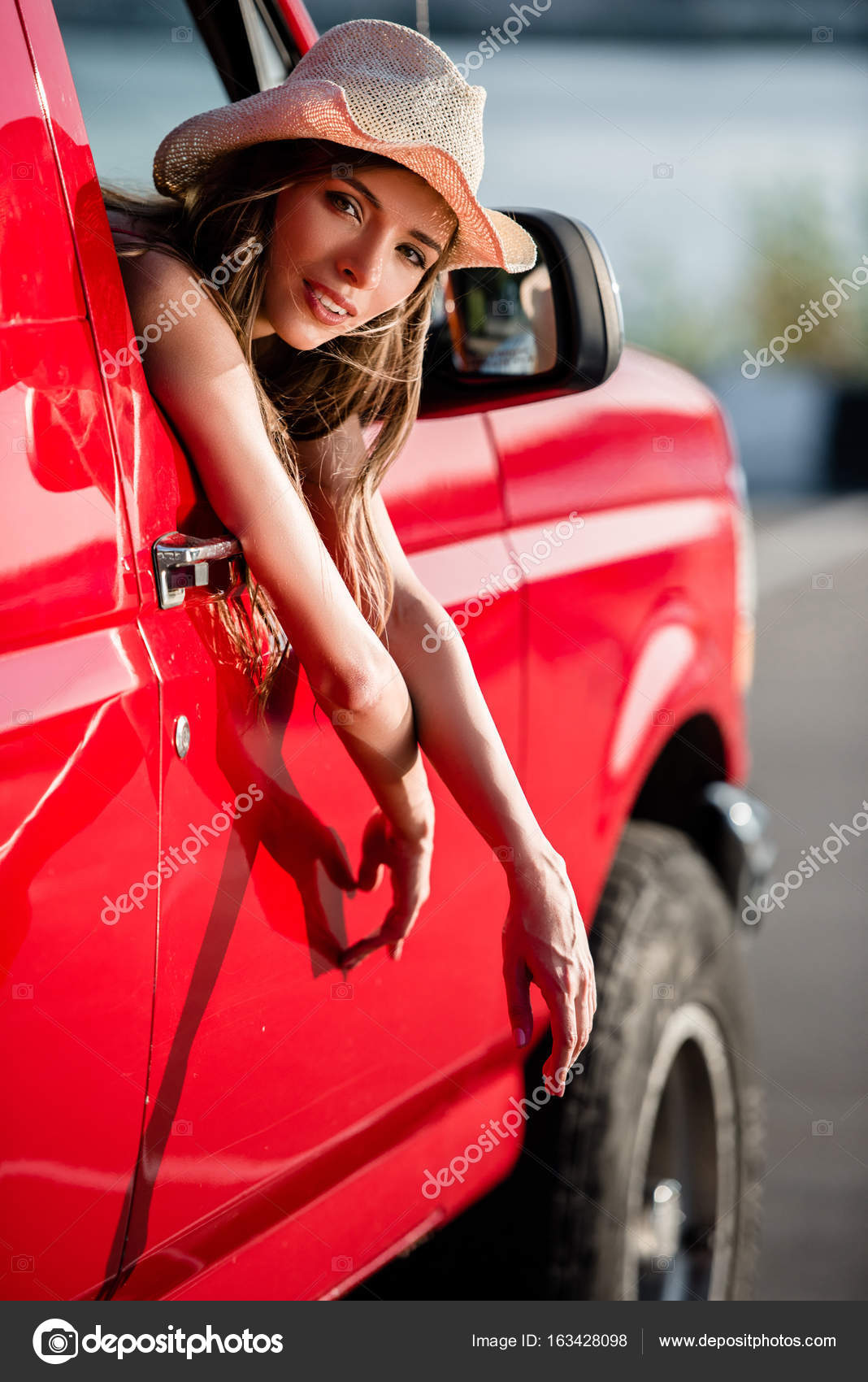 depositphotos_163428098-stock-photo-woman-looking-out-of-car.jpg