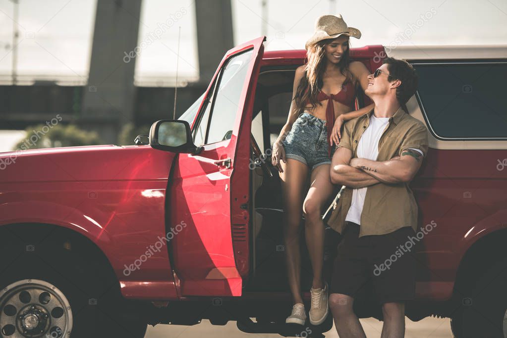 couple with classical car
