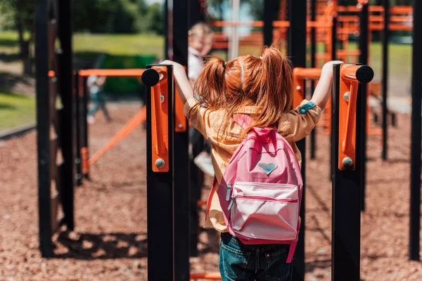 Redhead child on playground — Stock Photo, Image