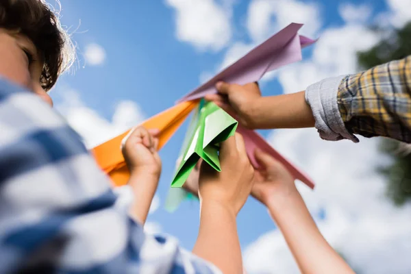 Kids playing with paper planes — Stock Photo, Image