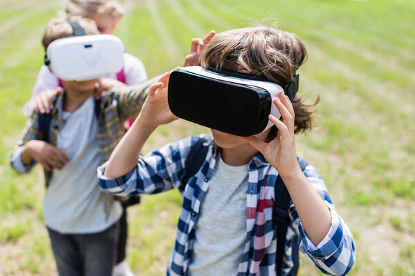 Kids using vr headsets Stock Picture