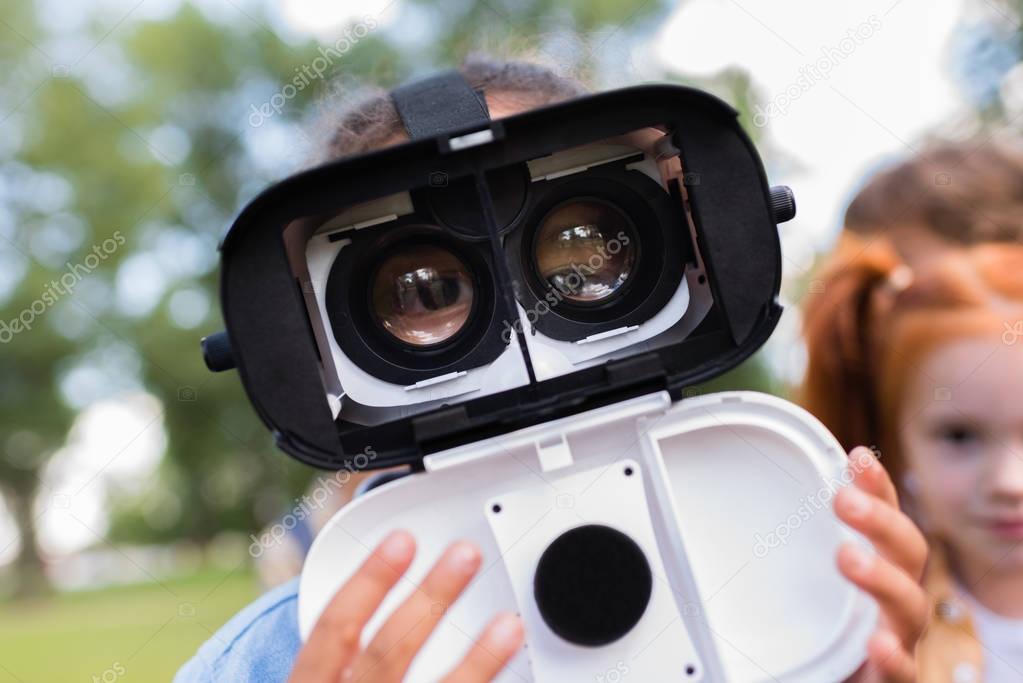 child in virtual reality headset