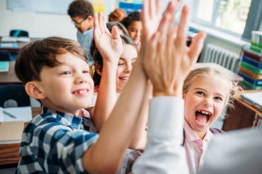kids giving high five to teacher clipart