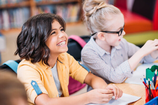 little girls in library