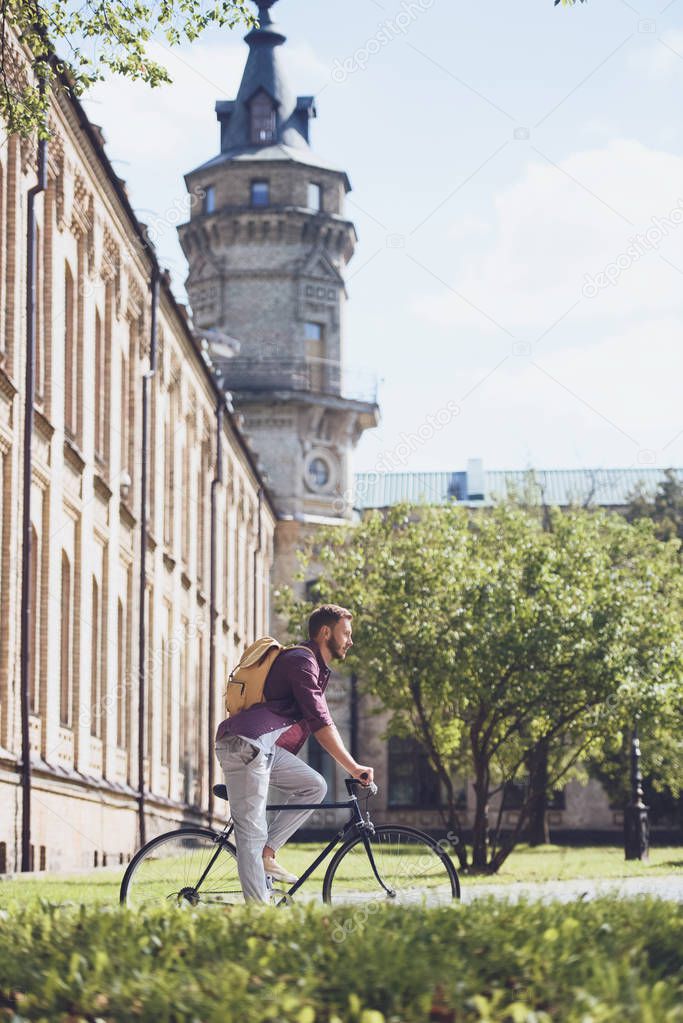 man riding bike