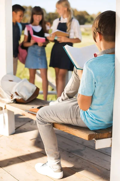 Teenager reading book — Stock Photo, Image