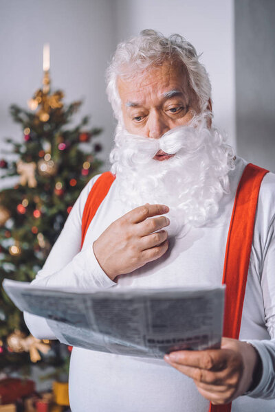 santa claus reading newspaper