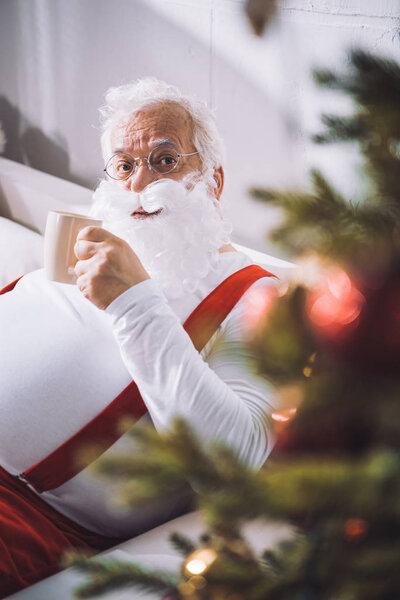 santa claus with cup of coffee