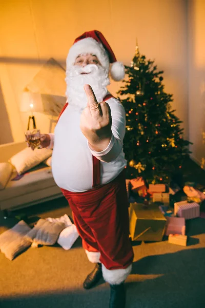 Bad santa showing middle finger — Stock Photo, Image