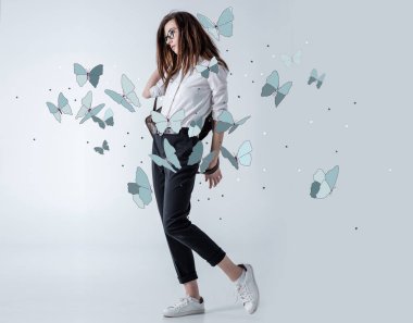 Stylish hipster woman with butterflies clipart