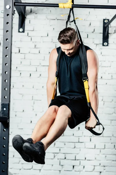 Sportsman training with trx — Stock Photo, Image