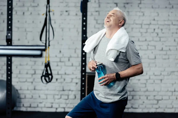 Senior sportsman with towel — Stock Photo, Image