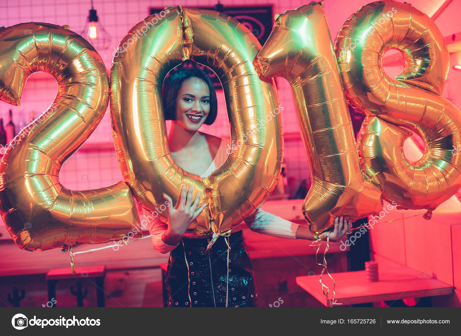 African american woman with balloons — Stock Photo © ArturVerkhovetskiy