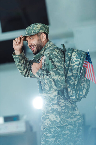 smiling soldier in military form