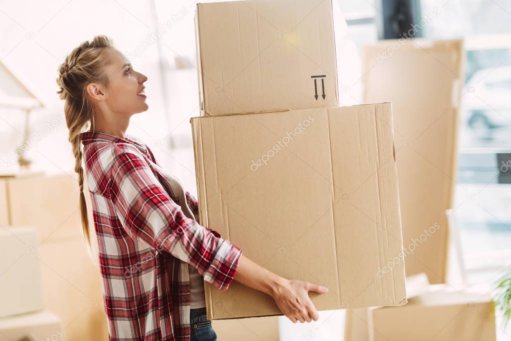 girl with cardboard boxes
