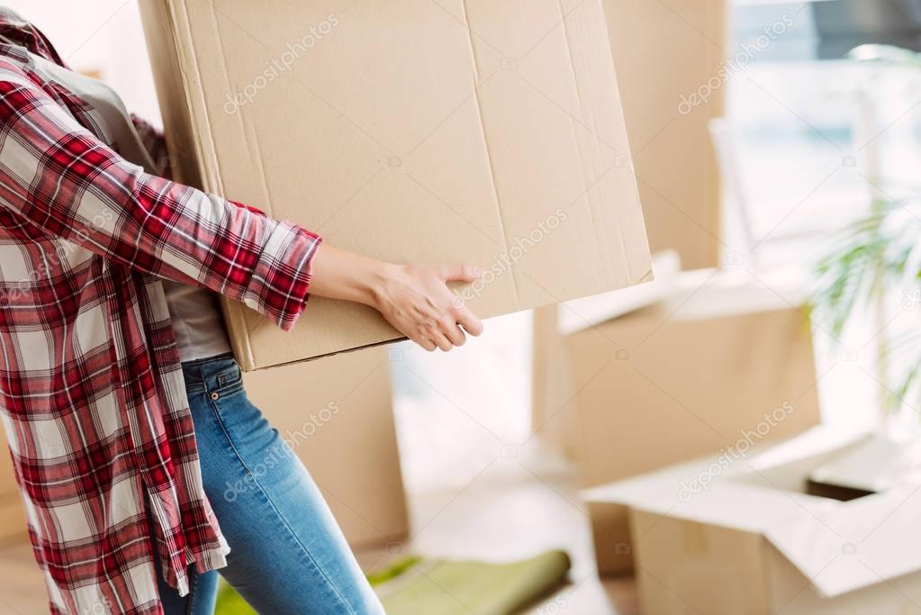 girl with cardboard boxes