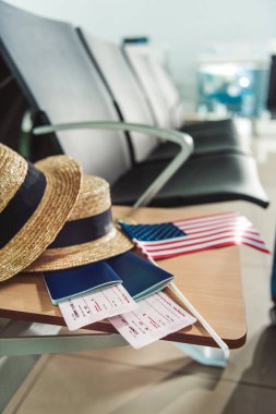 traveling equipment on chair at airport clipart