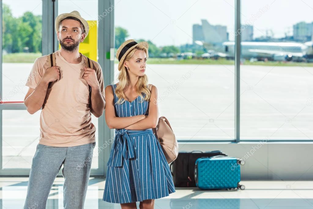 couple waiting for boarding in airport