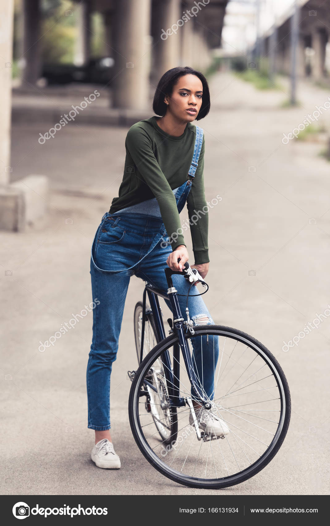 Riding bicycle — Stock Photo © ArturVerkhovetskiy 166131934