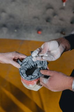 man applying talcum powder hands clipart