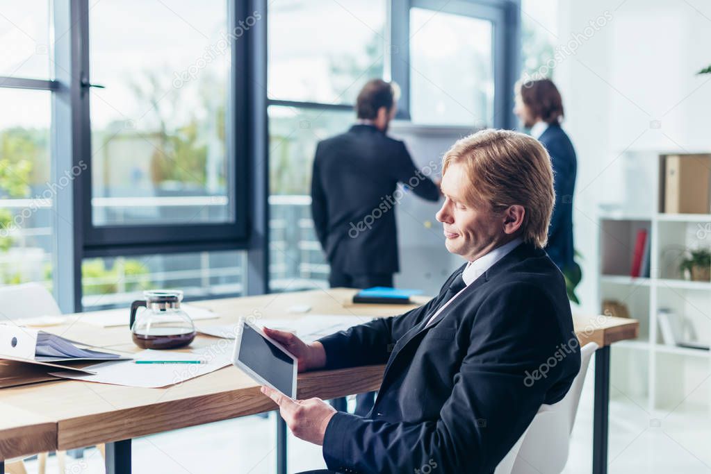 businessman using digital tablet