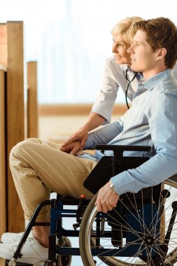 young man in wheelchair clipart