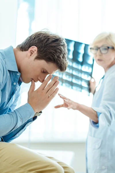 Young man dissapointed by diagnosis — Stock Photo, Image