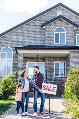 family standing in front of house on sale clipart