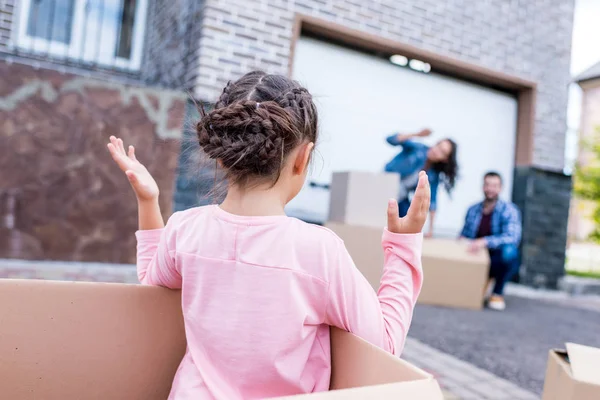 Little girl playing with parents — Stock Photo, Image