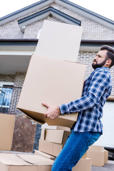 man moving into new house