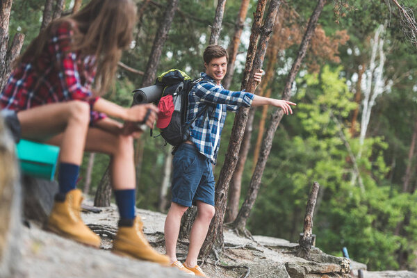 couple on hiking trip in forest